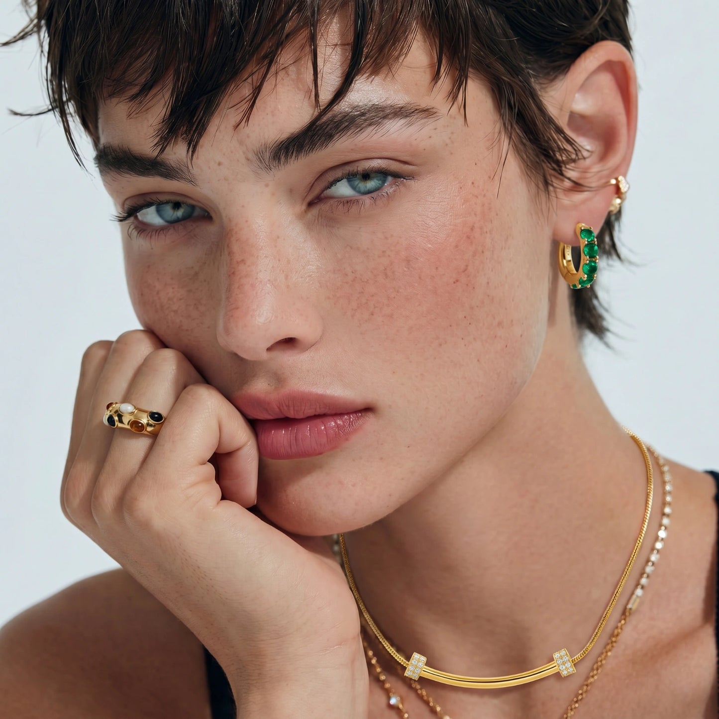 Emerald Huggie Hoops by MUKUN